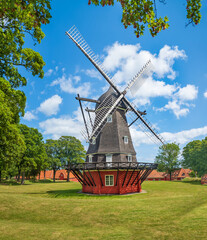 Obraz premium Old red windmill in Copenhagen, Denmark