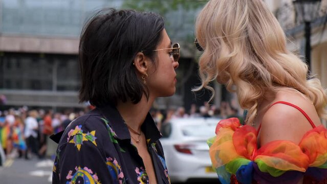 MS Female couple kissing in street