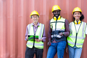 Portrait Professional Logistics and Warehouse Team smiling and looking to camera while working checking at Container cargo harbor to loading containers. Logistics import export shipping concept.