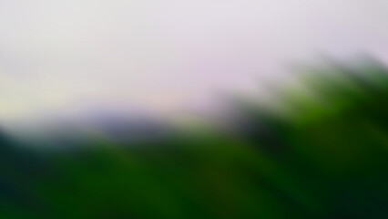 Abstract blurred background with white on the top and green on the bottom.
