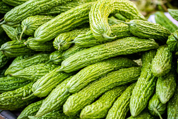 Pile of bitter melons on market 