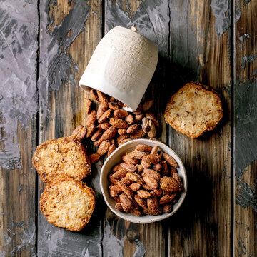 Sweet homemade snacks roasted almond nuts and shortbread cookies