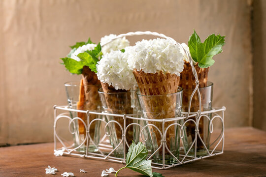 Waffle cones with white flowers