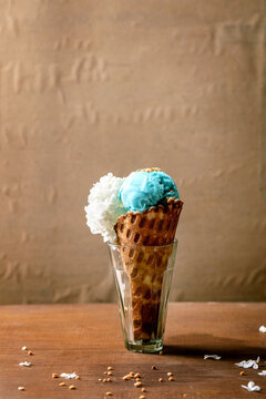 Turquoise ice cream in waffle cone