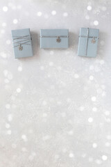 Grey gift boxes on grey concrete background