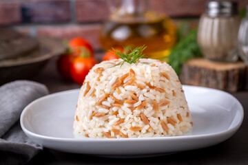 Traditional delicious Turkish food; Turkish style rice pilaf (Turkish name; Arpa sehriyeli pirinc pilavi)