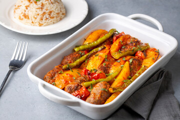 Traditional Homemade Turkish Food Kofte - Kofta with Tomato Sauce and Potatoes. (Turkish name; Izmir kofte)