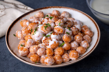 Traditional Turkish food, Mirik Kofte made from bulgur, onion and eggs with yoghurt
