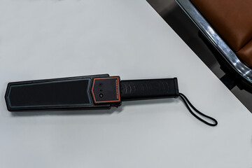 Handheld metal detector, airport security metal scanner tool for security checking  © Jack Tamrong