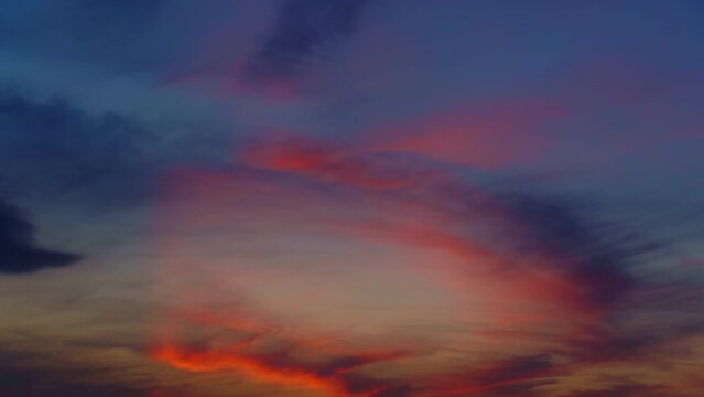 beautiful sunset sky time lapse, dark colorful clouds as abstract background
