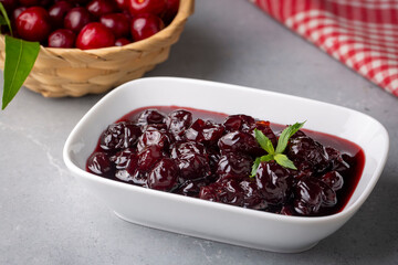Jars with freshly homemade cherry jam, sour cherry jam, Turkish name; Visne receli
