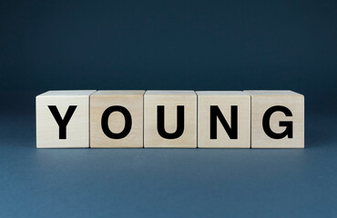 Young. Cubes form the word Young