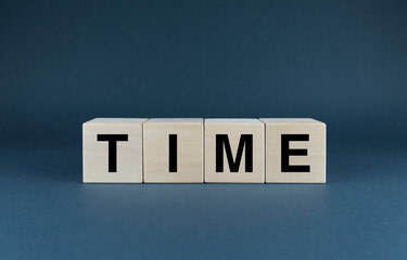 Time. Cubes form the word Time