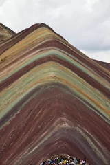 Foto op Plexiglas Vinicunca Vertical shot of  Montana Vinicunca rainbow hill with colorful layers