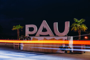 Ville de Pau, letters with name of the city on boulevard des pyrénées at night time