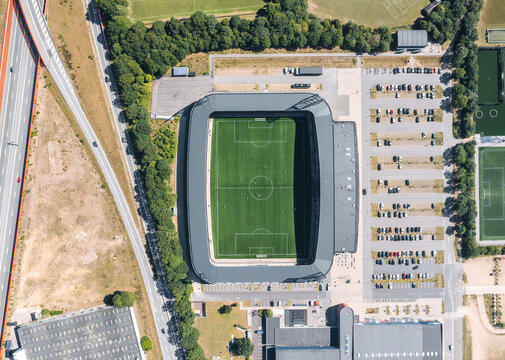 Aerial drone panoramic summer view over JYSK Park, Silkeborg IF (SIF) home football stadium. Silkeborg, Denmark - August 2022