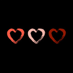 Three abstract multicolored hearts on a black background