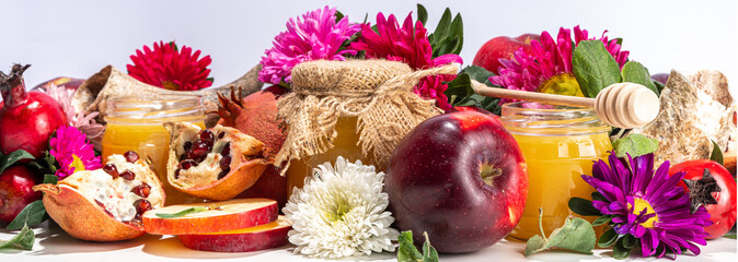Happy Rosh Hashanah background. jewish New Year Rosh Hashana holiday postcard greeting background, with traditional religion symbols - apple, honey, pomegranate, shofar, flatlay copy space