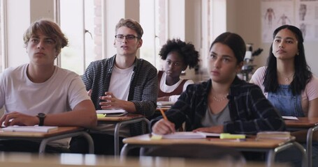 High school student in classroom asking question, learning and studying in his desk with teenage group and scholarship background. Knowledge and education of students and future leader raising hand