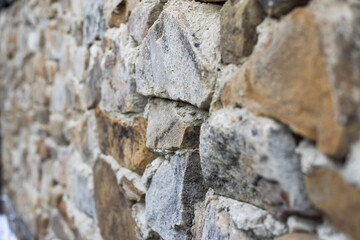 Texture of a stone wall. Old castle stone wall texture background. Stone wall as a background or texture. Part of a stone wall, for background or texture.