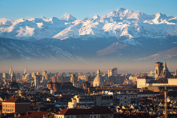 Turin (Torino) amazing cityscape with the city skyline and the Alps