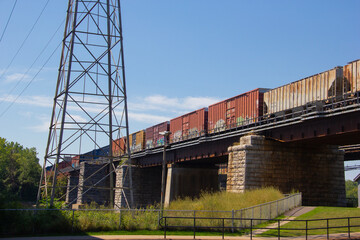Fototapeta na wymiar Freight train on a bridge