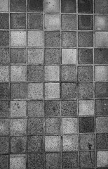 Vintage Tiled Street with Dirt and Grunge in Black and White.