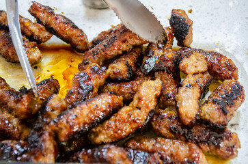 Tocino, a.sweet cured pork Filipino meat dish.