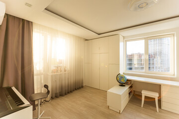 Stylish composition of cozy scandinavian child's room interior with wooden bed, toys and hanging decorations. Creative wall.