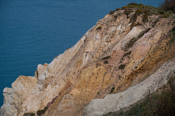 Face side profile in the colored rocks of Alum bay, Isle of Wight