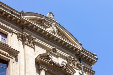 Detail of the facade of a historical building in downtown Lyon, France