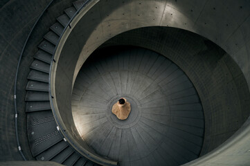 the woman is dancing by the stairs