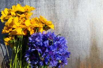 bouquet of blue and yellow flowers