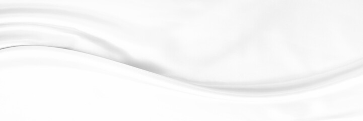 White gray satin texture that is white silver fabric silk panorama background with beautiful soft blur pattern natural.