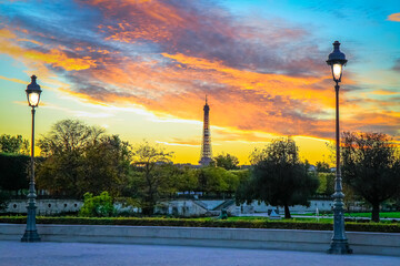Eiffel tower from Tuileries gardens at dramatic sunset, Paris, France