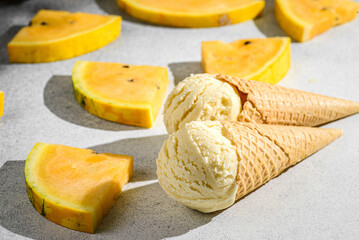 slices of yellow watermelon with ice cream