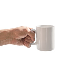 Hand holding porcelain mug with coffee or tea isolated on white background