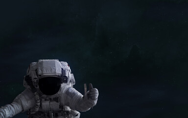 Obraz na płótnie Canvas Astronaut on background of deep space nebulae. Science fiction. Elements of this image furnished by NASA