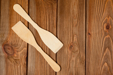Wooden spatulas for comfortable turning food while cooking.
