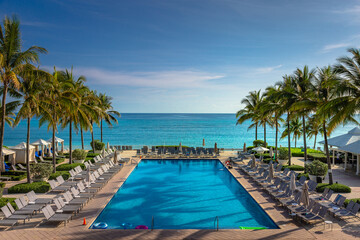 Tropical paradise: beach with pool, gazebos and palm trees, Montego Bay, Jamaica