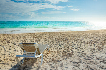 Fototapeta na wymiar Tropical paradise: Cancun caribbean with beach chair, Riviera Maya, Mexico