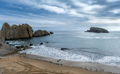 Fototapeta na wymiar Arnia beach in The Broken Coast, Spain