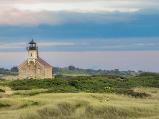 Fototapeta na wymiar Late afternoon summer photo of the North Lighthouse, New Shoreham, Block Island, Rhode Island. 