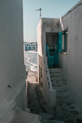 Narrow street and old houses on Paros Island in Greece