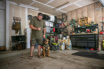 Marine veteran with service dog and family living life. - obrazy, fototapety, plakaty