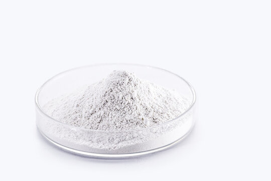 Phosphate, pile of phosphorous powder, used as a fertilizer or compost, for soil correction, or phosphating. Isolated background with copyspace