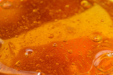 Closeup view of orange slime. Antistress toy