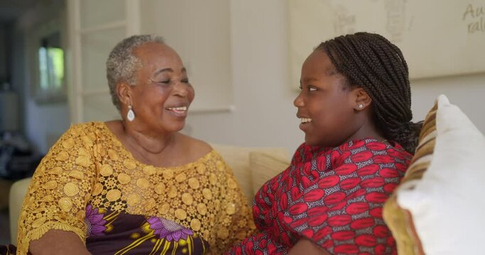 MS SLO MO Grandmother and granddaughter (14-15) relaxing at home