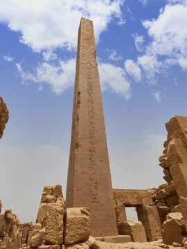 Ancient pharaonic obelisk in Egyptian Karnak temple in Luxor city