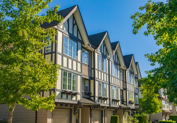 Fototapeta na wymiar Neighborhood modern houses building in BC, Canada. Canadian modern residential architecture